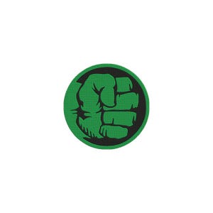May include: A circular embroidered patch featuring a stylized green fist on a black background. The design is enclosed within a thick green border, showcasing a textured fabric surface with detailed stitching throughout the graphic element.