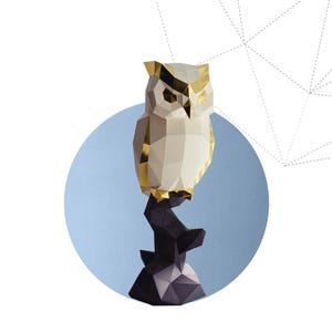 May include: A geometric papercraft owl with gold accents perched on a dark branch, set against a light blue circle. The text "OWL ON A BRANCH" is below the owl. The background is white with a dashed line design.