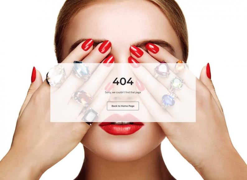 Puede incluir: Primer plano de un rostro con l&aacute;piz labial rojo y esmalte de u&ntilde;as rojo. La persona lleva varios anillos con piedras preciosas grandes. Una caja blanca cubre la cara con el texto "404" y "Lo sentimos, no pudimos encontrar esa p&aacute;gina."