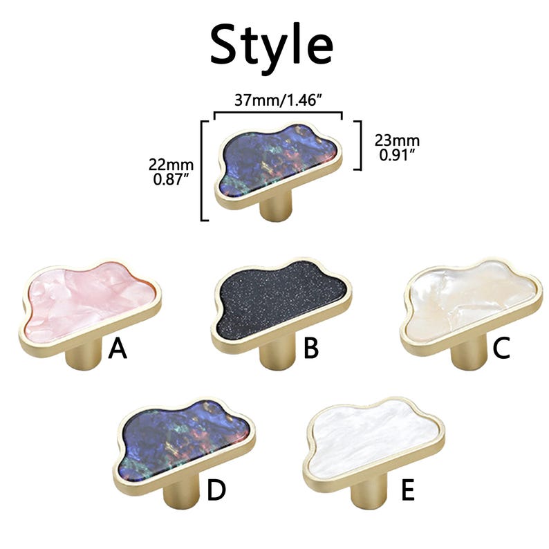 K&ouml;nnte beinhalten: Wolkenf&ouml;rmige Schrankkn&ouml;pfe in Gold mit verschiedenen Oberfl&auml;chen: Rosa, Schwarz, Wei&szlig; und Irisierend. Die Kn&ouml;pfe messen 37 mm breit und 22 mm hoch. Das Bild zeigt f&uuml;nf verschiedene Stile, die mit A bis E gekennzeichnet sind.