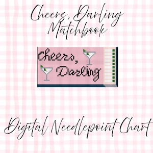 May include: A digital needlepoint chart with a pink background and the words "Cheers, Darling" in black script. Two martini glasses are featured. The words "Matchbook" and "Digital Needlepoint Chart" are also present.