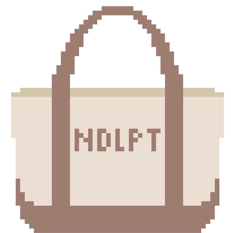 May include: A pixel art style tote bag in a light beige color with brown handles and a brown base. The text "NDLPT" is centered on the front of the bag in a brown pixelated font. The design features a simple rectangular shape with two vertical straps.