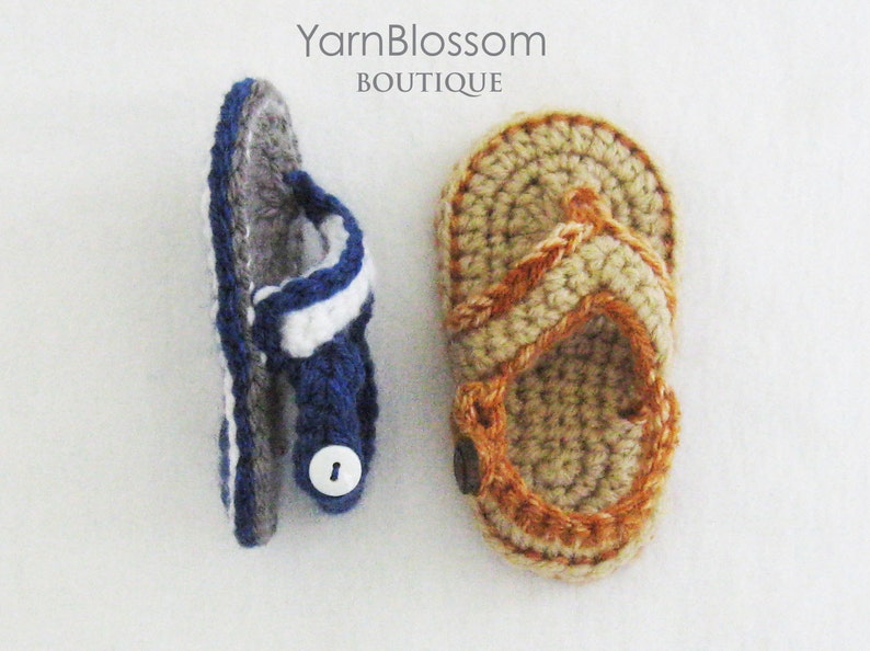 May include: Two pairs of crocheted sandals, one in blue and white with a grey sole, and the other in beige and brown. Both sandals have a button closure.