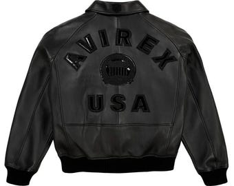 Chaqueta bomber de aviador Avirex USA de cuero negro para hombre, estilo urbano vintage.