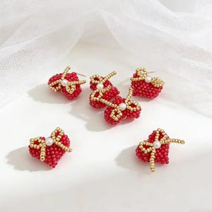 Handmade Beaded Heart Charm with Bow - Red and Gold Beaded Accessory for Hair Clips, Earrings, Zipper Pulls, Phone Strap and Jewelry Making