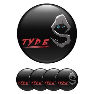 May include: Black round button with the word "TYPE" in red, and a gray hooded figure. Below are four more buttons with the word "TYPE" in red. The hooded figure has blue eyes.