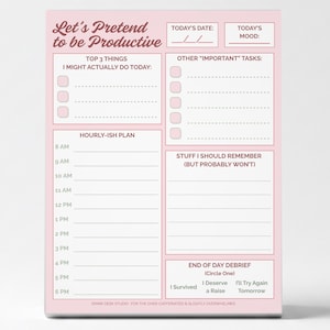 May include: A pink notepad with the text "Let's Pretend to be Productive." It features sections for daily tasks, an hourly plan, and a space for notes. The notepad is designed for organizing daily activities.
