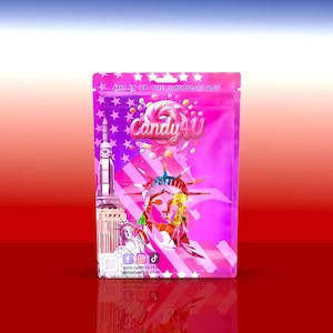 May include: A pink candy bag with the text "Candy4U" and the phrase "Mix it up the American Way." The bag features illustrations of the Statue of Liberty, a rocket, and stars. Social media icons are visible.