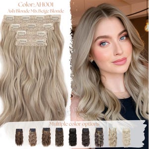 May include: Clip-in hair extensions in Ash Blonde Mix Beige Blonde. The extensions are shown with multiple color options. The image also shows a woman with long, wavy blonde hair. The text on the image says "VIVA HAIRS" and "Multiple color options."