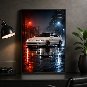 Puede incluir: Una impresión artística enmarcada que muestra un cupé Honda Integra Type R blanco estacionado en una calle urbana mojada por la noche. La escena presenta reflejos de luces rojas y azules sobre el asfalto mojado con edificios al fondo.