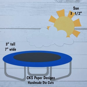 May include: A blue and gray paper die cut of a trampoline with a white cloud and yellow sun above it. The trampoline is 7 inches wide and 3 inches tall. The sun is 3 1/2 inches wide. The die cut is labeled "CKS Paper Designs Handmade Die Cuts".