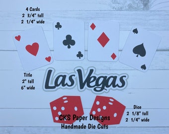 May include: A collection of handmade paper die cuts featuring playing card suits, two red dice, and the text "Las Vegas." The cards are approximately 2.75 inches tall and 2.25 inches wide. The dice are approximately 2.13 inches tall and 2.25 inches wide.