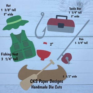 May include: A set of paper die cuts for a fishing themed craft project. The set includes a hat, fishing vest, tackle box, fishing pole, bobber, and a canoe with a paddle. The die cuts are made of cardstock and are ready to be assembled.