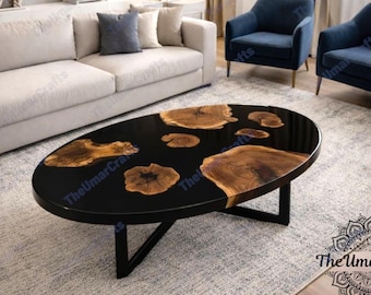 Owalny, czarny stolik kawowy z żywicy epoksydowej do wystroju domu