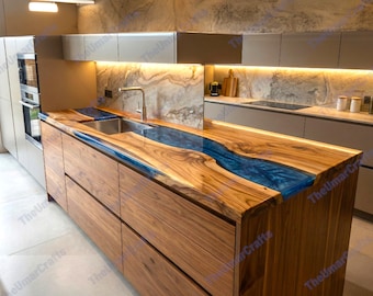 May include: A custom kitchen island with a wooden base and a countertop featuring a blue resin river design. The island has a built-in sink and faucet. The cabinetry is a warm brown color.