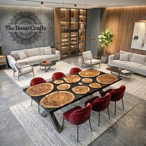May include: A modern dining room featuring a large, black epoxy resin table with wood slice inlays. The table is surrounded by burgundy velvet chairs. The room includes a gray sofa, a wine cabinet, and a decorative wall art.
