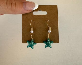 Blue resin starfish dangle earrings with pearl! Handmade by me :)