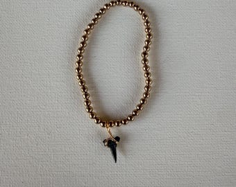 gold beaded bracelet with shark tooth!! found and made by me!