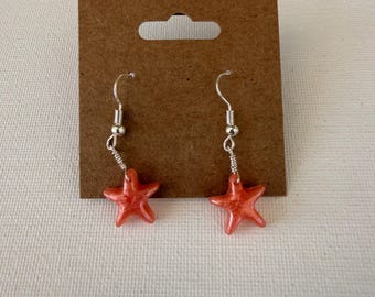 pink/coral resin starfish dangle earrings! Handmade by me :)