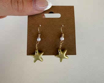 Gold resin starfish dangle earrings with pearl! Handmade by me :)