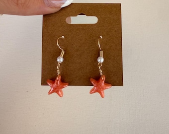 pink/coral resin starfish dangle earrings with pearl! Handmade by me :)