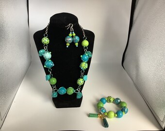 Trio jewelry set (necklace, bracelet, earrings) — wood beads are hand painted and wire wrapped.  Dangles are simmulant turquoise.