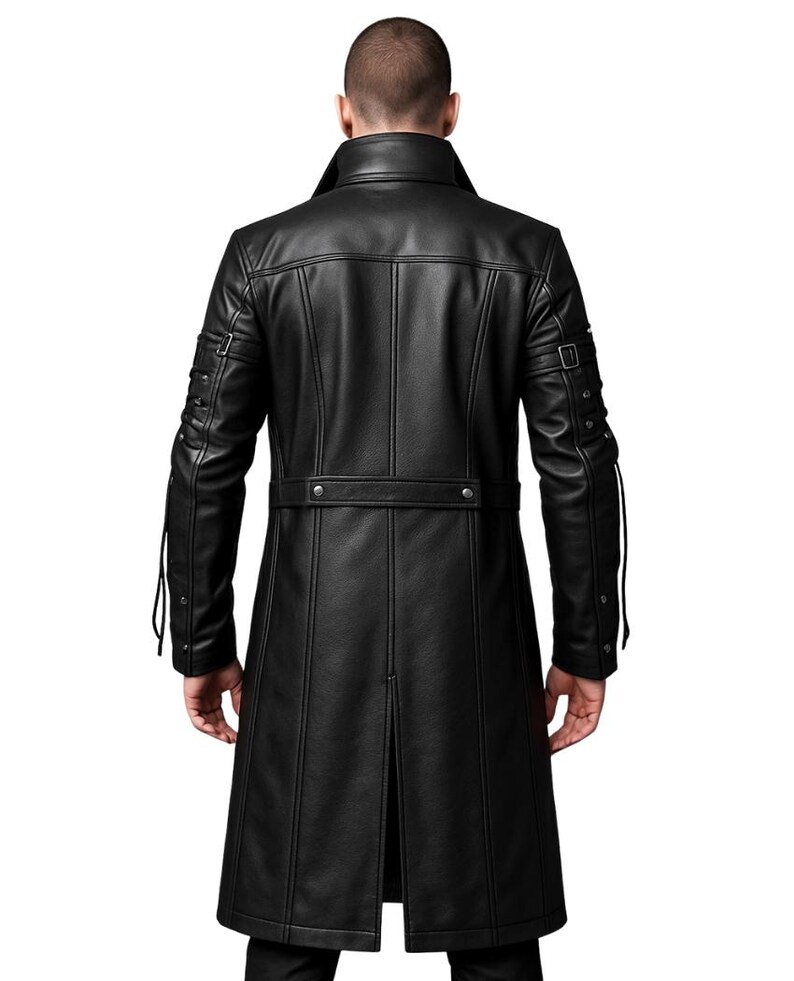 May include: A black long coat featuring a high collar, vertical seam detailing, and a horizontal waist belt with metallic buttons. The sleeves include adjustable buckle straps and decorative metal studs, with a central back vent at the hem.