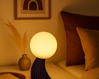 Glazen bol tafellamp: sculpturale verlichting