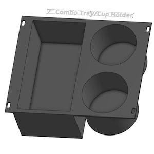 May include: A black combo tray and cup holder with a rectangular tray and two circular cup holders. The text "7" Combo Tray/Cup Holder" is printed on the top. The tray is approximately 7 inches wide.
