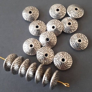10pcs- 1.5mm hole silver tone bicone beads