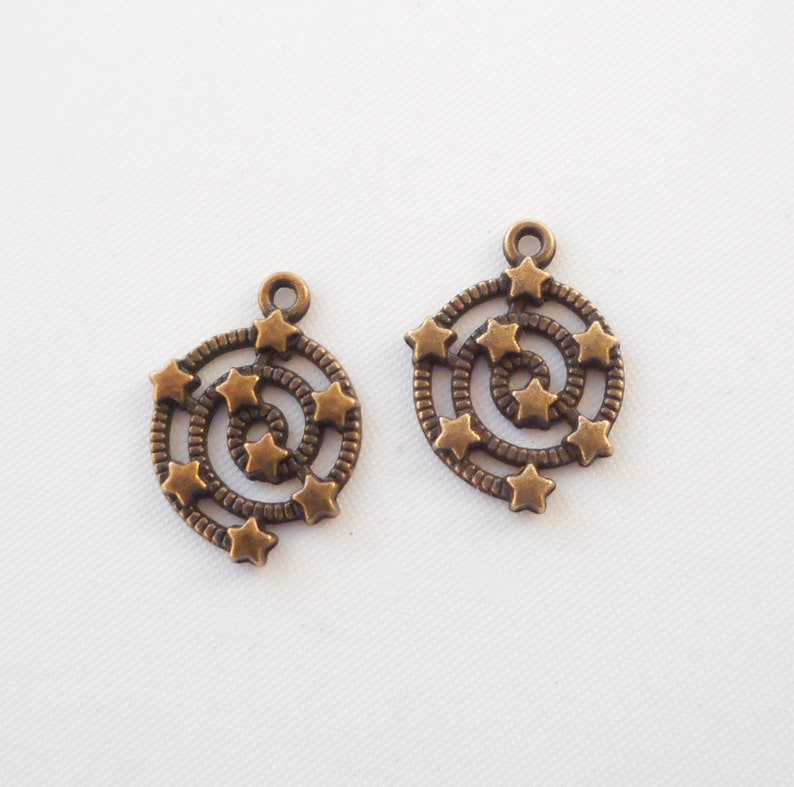 8pcs-silver tone Spiral with stars charm-bronze tone available image 8