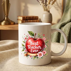 May include: White ceramic mug featuring a vibrant red apple design with the text "Best Teacher Ever." The apple is surrounded by pink flowers, green leaves, and a gold ribbon. A perfect gift for teachers.