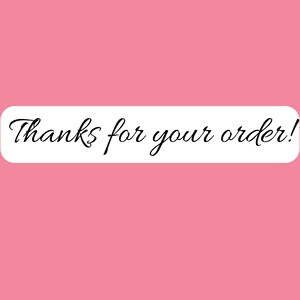 May include: A rectangular white sticker with rounded corners featuring the black cursive text Thanks for your order! set against a solid pink background. The design is simple and clear, with the message centered horizontally on the white label.