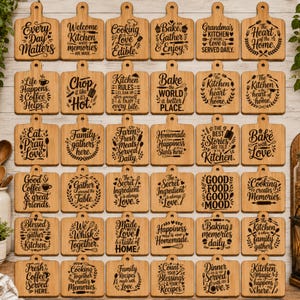 May include: A collection of thirty rectangular bamboo cutting boards with handles, each featuring unique black laser-engraved kitchen-themed quotes and illustrations, arranged in a grid pattern on a light wood surface.