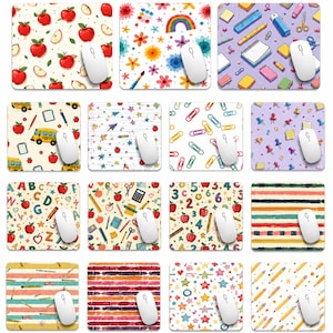 May include: A collection of sixteen square mouse pads featuring various patterns including apples, flowers, rainbows, school supplies, paper clips, push pins, alphabet letters, numbers, stripes, and stars, each with a white computer mouse on top.