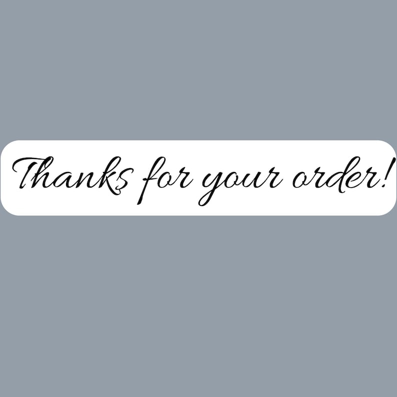 May include: A rectangular white sticker with rounded corners featuring the black cursive text Thanks for your order! printed in the centre. The sticker has a clean, simple design with a smooth finish and clear, legible lettering for customer communication.