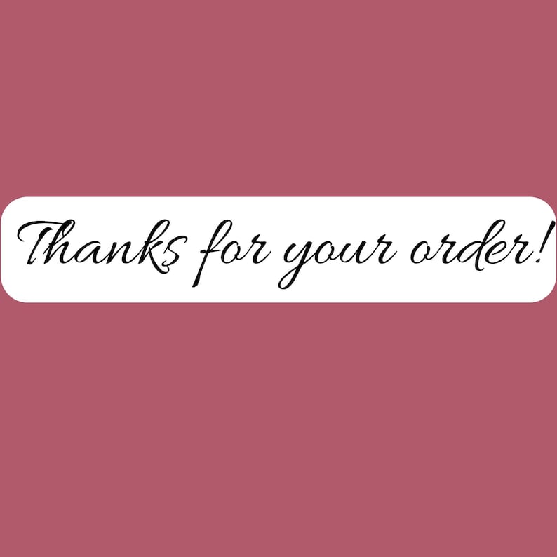 May include: A rectangular sticker with a white background and rounded corners featuring the black cursive text Thanks for your order! centered on the surface. The sticker is presented against a solid, muted mauve-colored background.