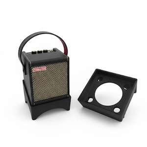 May include: A black and gold guitar amplifier with a handle and a separate black stand. The amplifier has a red and white logo on the front. The stand has a large circular opening.