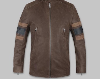 May include: Brown leather jacket with a stand-up collar and a full-length zip. The jacket has two zipped pockets and decorative stripes on the sleeves. The jacket is a medium brown colour.