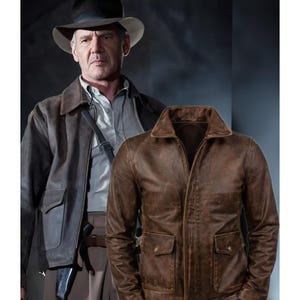 May include: A brown leather jacket with two front pockets and a collar. The jacket is displayed next to a person wearing a similar jacket and a fedora hat. The jacket has a distressed look.