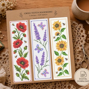 May include: A brown card featuring three cross stitch bookmark patterns with the text CROSS STITCH BOOKMARKS 3 designs PDF Pattern Instant Download. The designs include red poppies, purple lavender with butterflies, and yellow sunflowers with bees.
