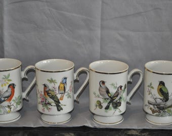 Vintage Royal Crown porcelain coffee cups: colorful hand-painted birds and gold trim