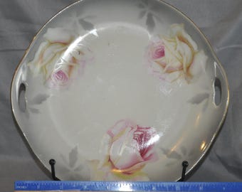 German porcelain hand-painted plate: by Vessra P.V. with roses and gold trim