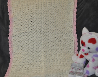 Crocheted Cream colored baby blanket with Pink edging