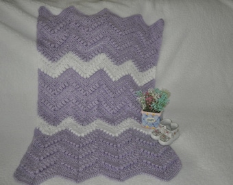 Purple and white ripple crocheted baby throw with bubble stitch