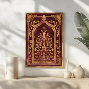 May include: A framed wall art print featuring a burgundy background with a gold floral design. The artwork has an arched center and ornate gold borders. The print is displayed on a light-colored surface with decorative vases.