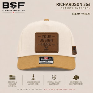 May include: A cream and wheat colored snapback hat featuring a brown rectangular leather patch on the front with the text YOUR DESIGN HERE and a small BSF logo. A small American flag patch is on the side, and a Richardson 356 sticker is on the brim.