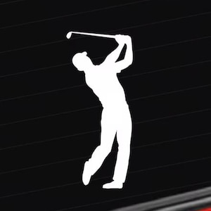 Könnte beinhalten: Weiße Silhouette eines Golfspielers im Schwung vor schwarzem Hintergrund. Der Golfer trägt eine Kappe und schwingt einen Golfschläger. Das Bild ist eine einfache, grafische Darstellung des Golfsports.