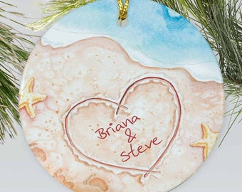 Engaged Personalized Couples Beach Christmas Glass Ornament Personalized with Names and Date written in the sand