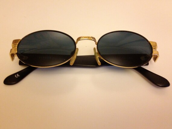 black aviator sunglasses with gold trim